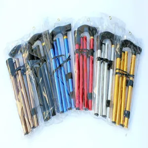 Detail view of foldable 5-section aluminum alloy trekking poles in various metallic colors