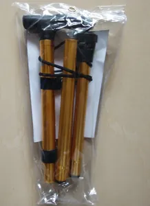 Foldable golden aluminum alloy hiking pole with T-handle packed in a clear plastic bag