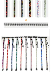 Detailed view of patterned aluminum alloy folding hiking poles with T-handles for seniors