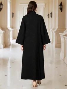 Elegant black long evening abaya with intricate embroidery and gold trim back view