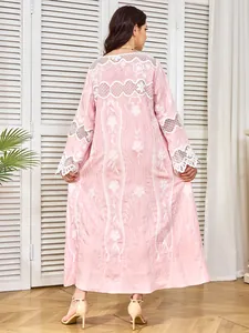 Elegant pink embroidered maxi dress with white lace details shown from the back