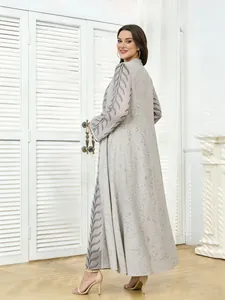 Elegant long-sleeved ethnic maxi dress with intricate embroidery and lace details back view