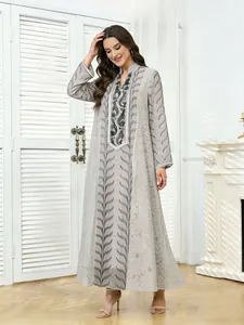 Elegant ethnic embroidered maxi dress featuring delicate mesh sequins and long sleeves