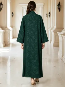 Back view of elegant dark green embroidered long dress for women's parties