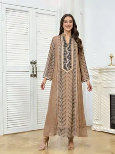 Full length view of ethnic mesh maxi dress with beaded embroidery and sequins detail.