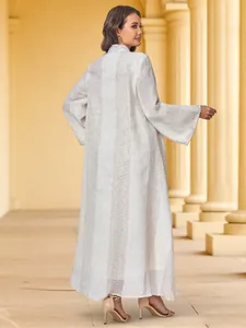 Elegant long sleeve striped abaya dress for women in soft beige and white tones