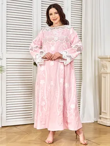 Elegant pink maxi dress with white lace embroidery for evening parties and events.