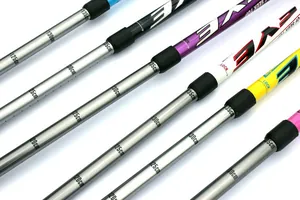 Detail of adjustable aluminum trekking poles with height markings and lock mechanism
