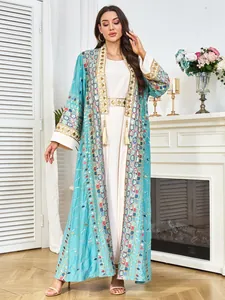 Elegant turquoise embroidered kaftan dress with heavy sequins and tassels for luxury occasions