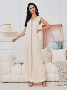 Full view of an elegant cream sleeveless maxi dress with heavy vertical beadwork detail