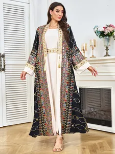 Elegant two-piece Abaya maxi dress featuring heavy gold sequin embroidery and tassels