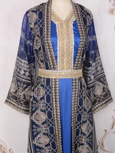 Detailed view of elegant two-piece navy blue Kaftan with gold embroidery and belt