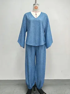 Blue polka dot two-piece loungewear set featuring loose batwing sleeve top and jogger pants