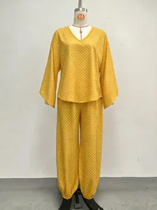Full silhouette of yellow retro polka dot loose batwing sleeve top and jogger set