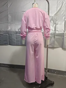 Back view of pink two-piece loungewear set with sweatshirt and wide-leg pants