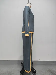 Detailed side view of dark grey and yellow contrast trim cardigan and wide-leg pants set