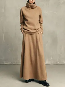 Minimalist camel two-piece set featuring high-neck sweatshirt and elegant maxi skirt