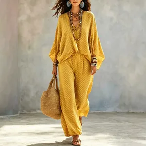 Vintage yellow polka dot two-piece set with batwing sleeve top and loose trousers