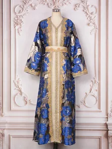 Detailed luxury blue and gold floral kaftan evening dress with heavy beadwork