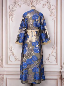 Detailed back view of an elegant blue and gold floral embroidered party maxi dress.