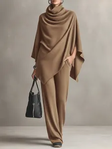 Elegant camel two-piece set with a draped poncho top and matching wide-leg trousers