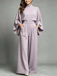 Detailed view of lavender turtleneck top and matching wide-leg trousers set