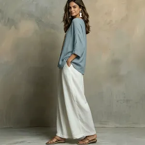 Bohemian lockeres elegantes Set mit blauem Oberteil und weißer Hose mit weitem Bein