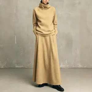 Minimalist tan turtleneck sweatshirt and maxi skirt two-piece set for women