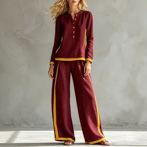 Two-piece burgundy tunic and wide-leg pants set with yellow contrast trim for women