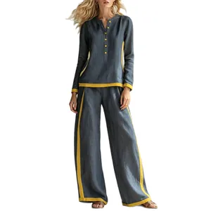 Two-piece contrast stitch linen set with long sleeve button top and wide leg pants