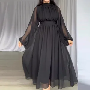 Full-length view of an elegant black mesh patchwork long sleeve maxi dress for women.