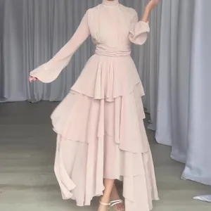Elegant beige tiered mesh maxi dress featuring a high neck and ruffled layers for a graceful look