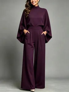 Elegant deep plum wide-leg trousers set with a stylish half-high collar cape top
