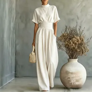 Elegant cream high-neck short-sleeved wide-leg jumpsuit with pleated waist detail