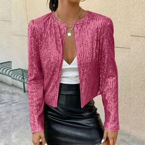 Close-up of a stylish magenta sequined cropped jacket featuring a textured finish