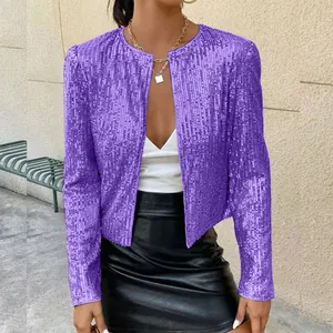 Detailed view of women's purple sequined short jacket with shiny texture for party fashion.