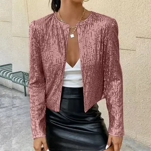 Detailed view of a stylish rose gold sequined cropped jacket for women in street style