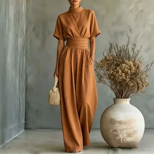 Elegant brown short-sleeved wide-leg jumpsuit with a semi-high collar for women.