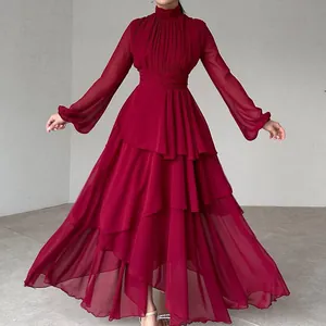 Elegant burgundy layered chiffon maxi dress featuring long sleeves and a sophisticated high neck