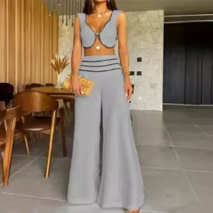 Elegant grey two-piece set featuring a cropped vest and high-waisted wide-leg pants