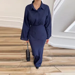 Elegant navy blue three-piece set with long sleeve shirt and matching maxi skirt