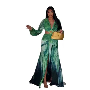 Elegant green printed long-sleeved maxi dress with high split for beach vacations.