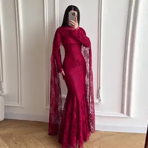 Elegant burgundy lace mermaid evening gown featuring a floor-length sheer shawl cape detail