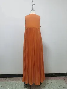 Detailed back view of an orange sleeveless pleated maxi dress shown on a mannequin