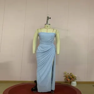 Detailed look at elegant light blue strapless dress with pleated waist and high slit