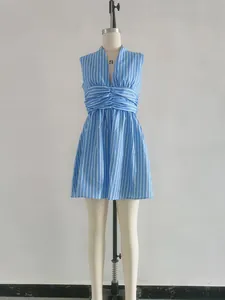 Close-up of blue striped sleeveless V-neck dress with ruched waist on mannequin