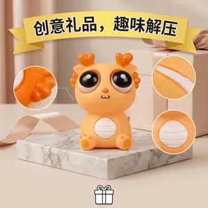 Cute orange popping-eye dragon squeeze toy for stress relief and fun creative gifting