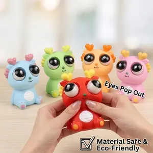 Set of five colorful pop-eye dragon squeeze toys for stress relief and sensory play