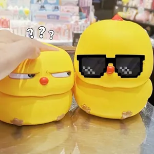 Jouet à presser poussin jaune mignon à rebond lent pour soulager le stress avec lunettes