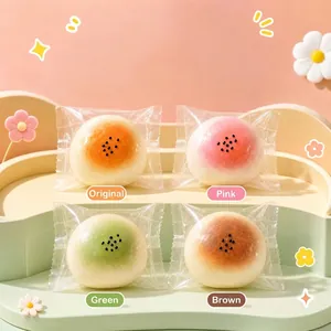 Jouets à presser réalistes en forme de pâtisserie au jaune d'œuf en quatre coloris.